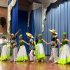 Presentación de grupo de danzas en el festival intercolegiado